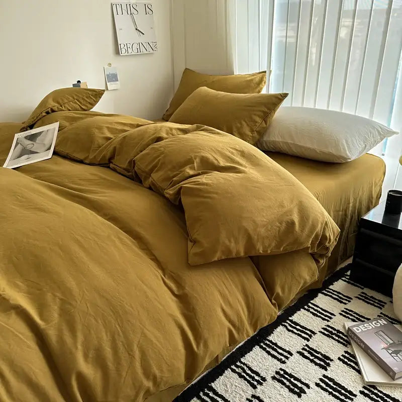 Gray quilted solid cotton duvet cover bedding set on a bed in a bright bedroom Decorbites on Tampa Home & Garden Store