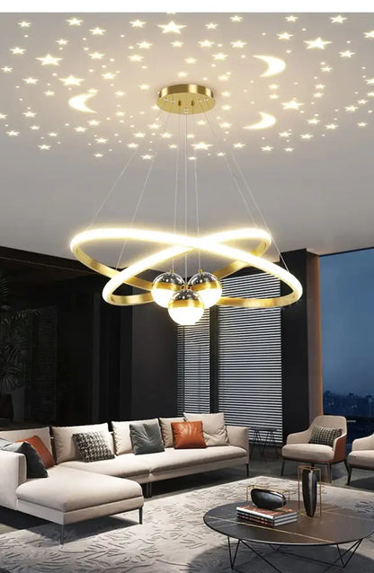 Black Gold Ring Chandelier by Decorbites with two interlocking gold rings and glowing orbs on Tampa Home & Garden Store