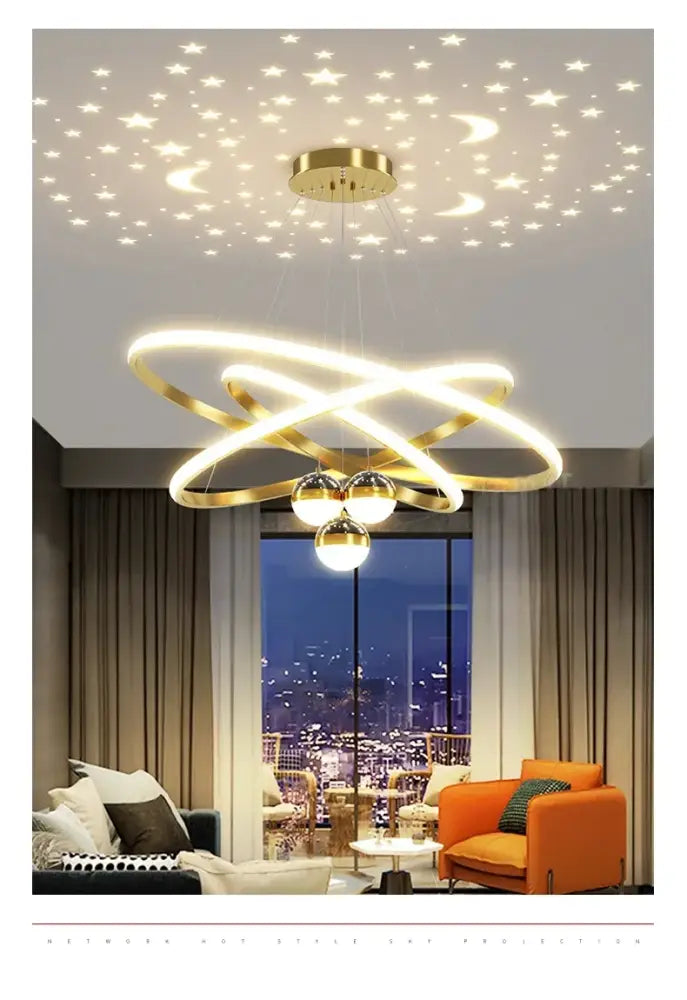 Black Gold Ring Chandelier by Decorbites: gold interlocking ring pendant lamp in living room on Tampa Home & Garden Store