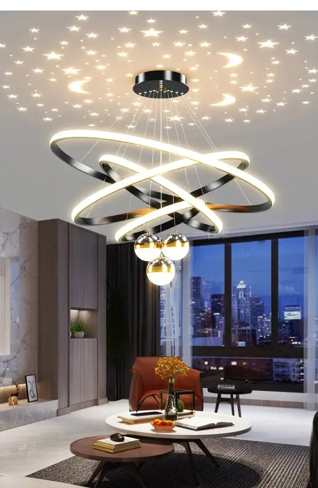 Black Gold Ring Chandelier by Decorbites with interlocking rings over a modern living room on Tampa Home & Garden Store