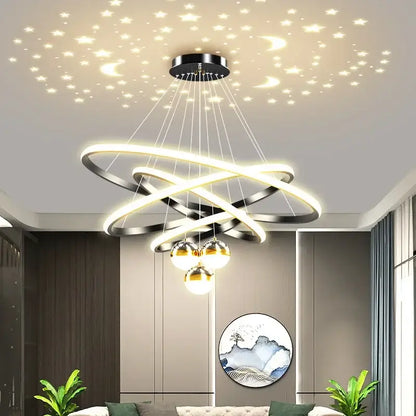 Black Gold Ring Chandelier by Decorbites, interlocking rings with gold pendants and LED glow on Tampa Home & Garden Store