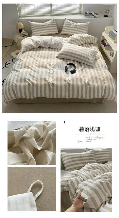 Cream striped quilt duvet cover set by Decorbites on a bed with 4 striped pillows in beige on Tampa Home & Garden Store