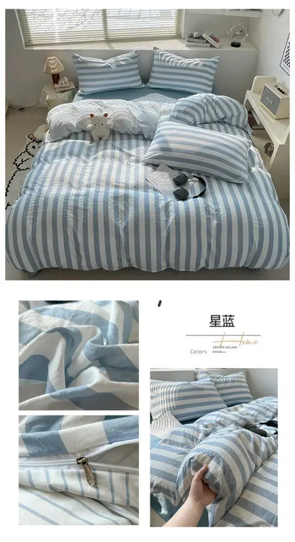 Blue and white striped quilt duvet cover by Decorbites on a sunlit bedroom bed on Tampa Home & Garden Store