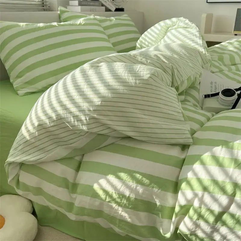 Cream Striped Quilted Quilt by Decorbites; green striped bedding set on Tampa Home & Garden Store