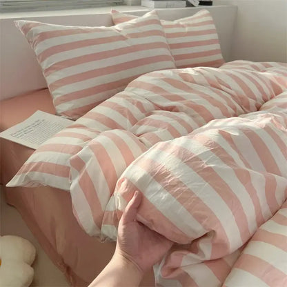 Cream Striped Quilted Quilt duvet cover by Decorbites in pink and cream stripes on bed on Tampa Home & Garden Store
