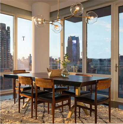 Chandelier Decorbites green glass swirl pendant lighting with brass accents for dining on Tampa Home & Garden Store