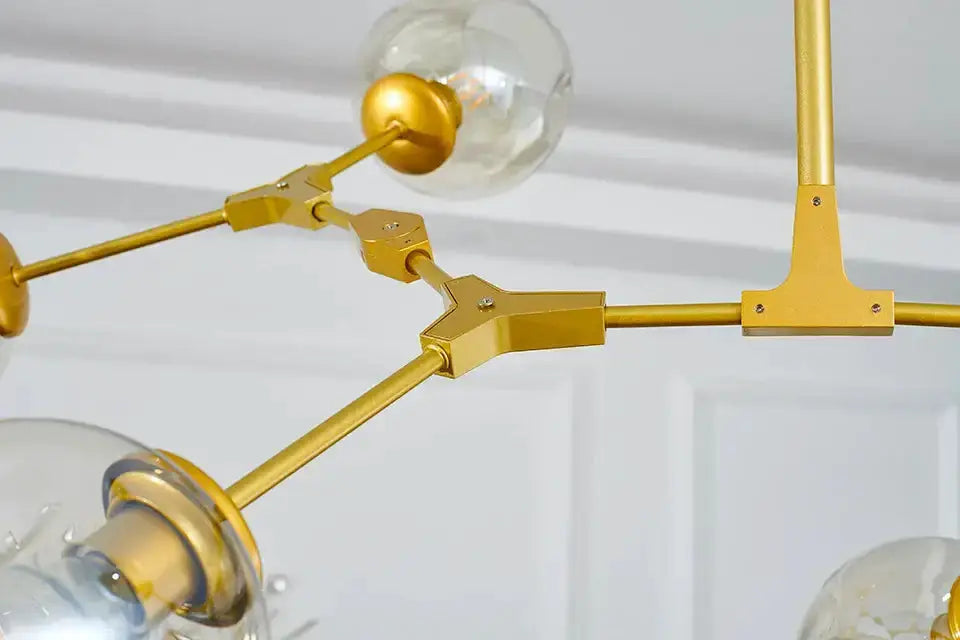 Chandelier Decorbites gold metal frame with clear glass globes on Tampa Home & Garden Store