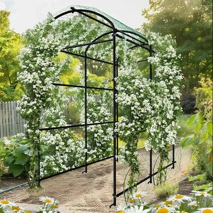 Tall black metal arched plant trellis with white flowering vines Decorbites on Tampa Home & Garden Store