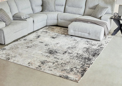 Langwell area rug by Unique Piece Furniture in gray with subtle distressed pattern on Tampa Home & Garden Store