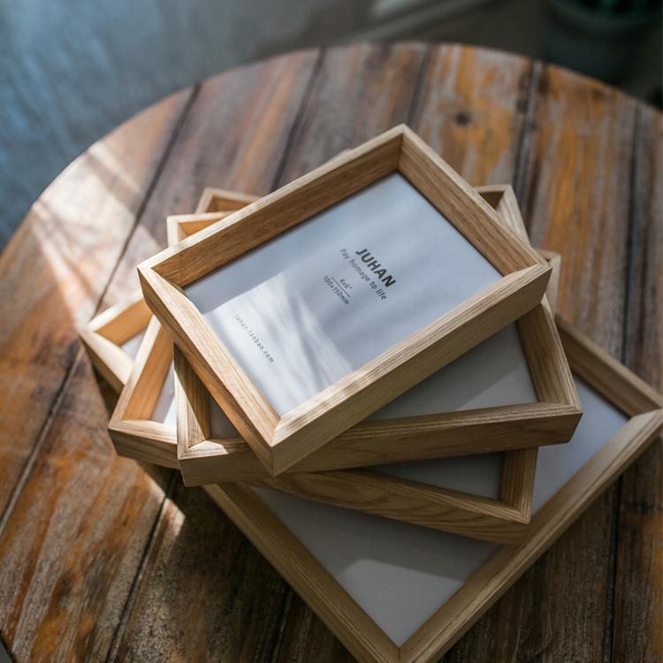 Desktop solid wood photo frame set in light oak, rectangular frames stacked in a pile on Tampa Home & Garden Store