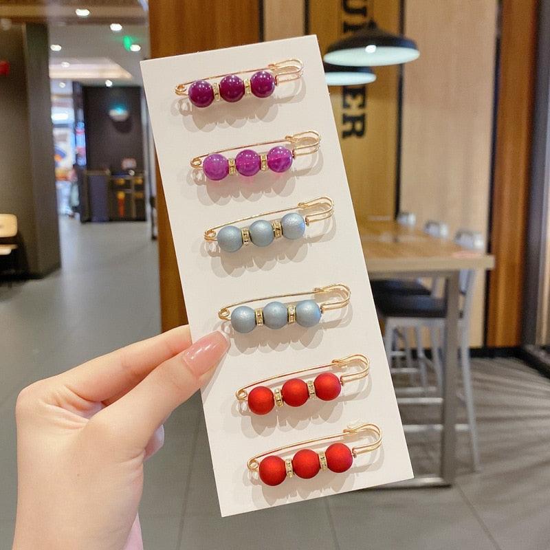 Stevvex beaded hair pins set on display card with six color beads purple pink blue gray red on Tampa Home & Garden Store