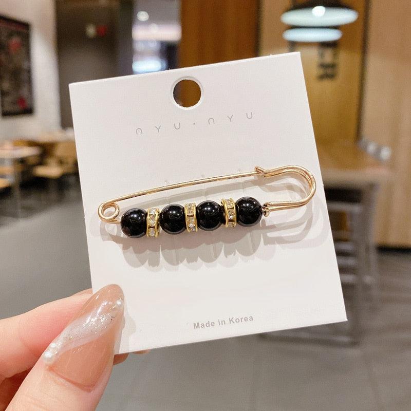 Gold-tone hair pin with black beads and spacers on white display card Made in Korea on Tampa Home & Garden Store