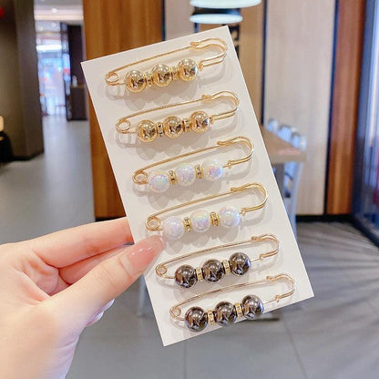 Stevvex hair pins set on display card; six gold-tone bobby clips with dark beads on Tampa Home & Garden Store