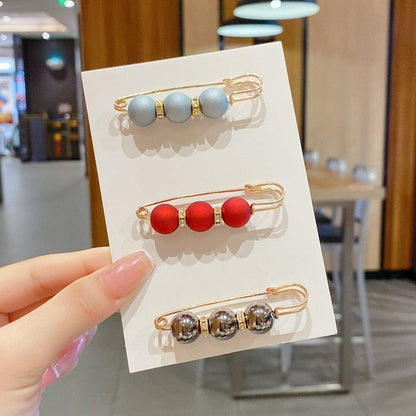 Stevvex beaded metal hair pins on display card in blue red and gray marbled beads on Tampa Home & Garden Store