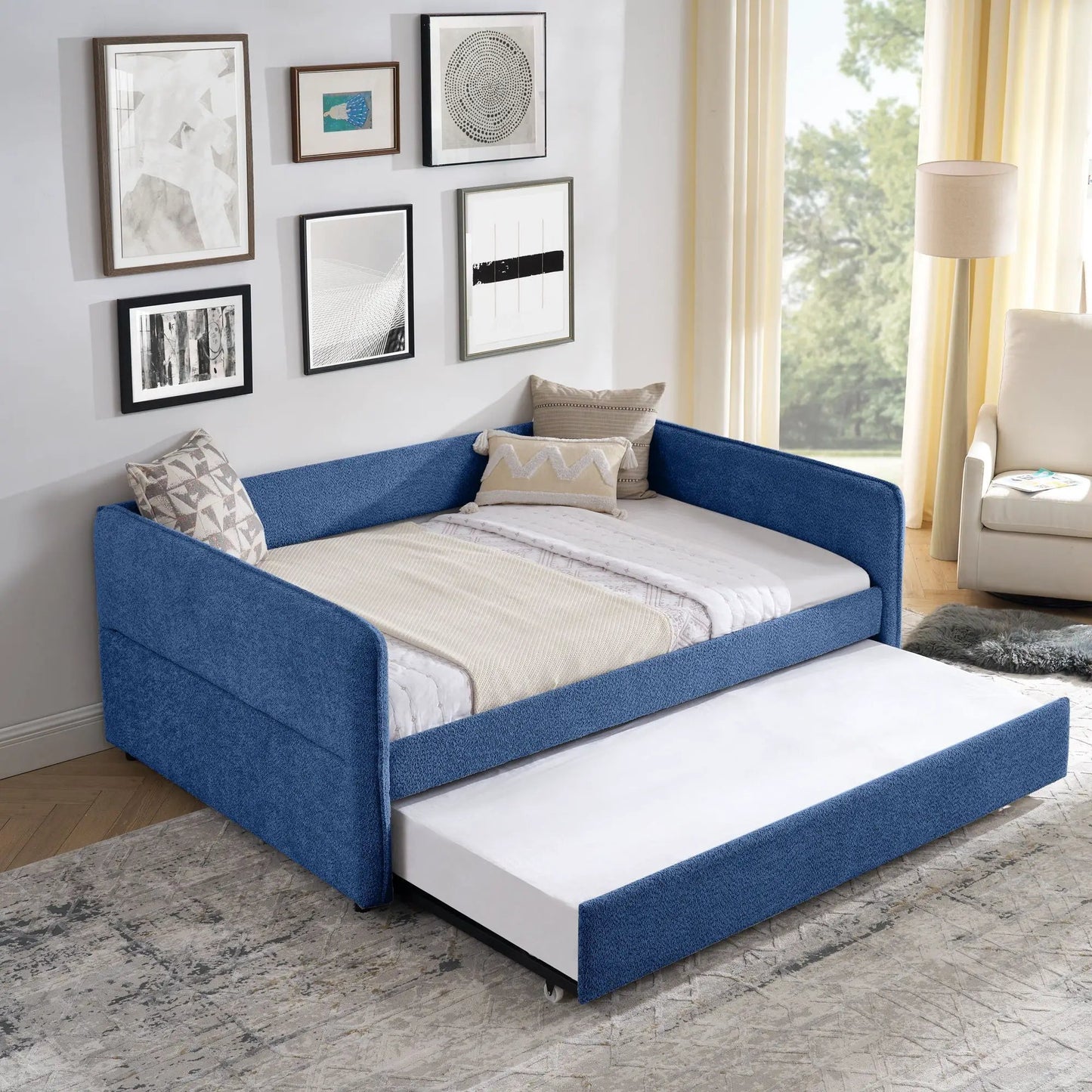 Upholstered daybed with blue fabric and pop-up trundle by Unique Piece Furniture on Tampa Home & Garden Store