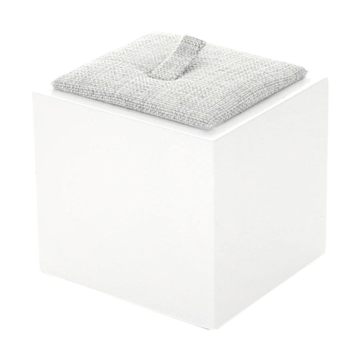 Single Ring Display on white cube stand with gray fabric ring pad on Tampa Home & Garden Store