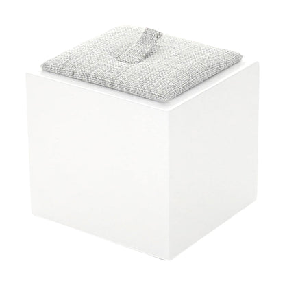 Single Ring Display on white cube stand with gray fabric ring pad on Tampa Home & Garden Store