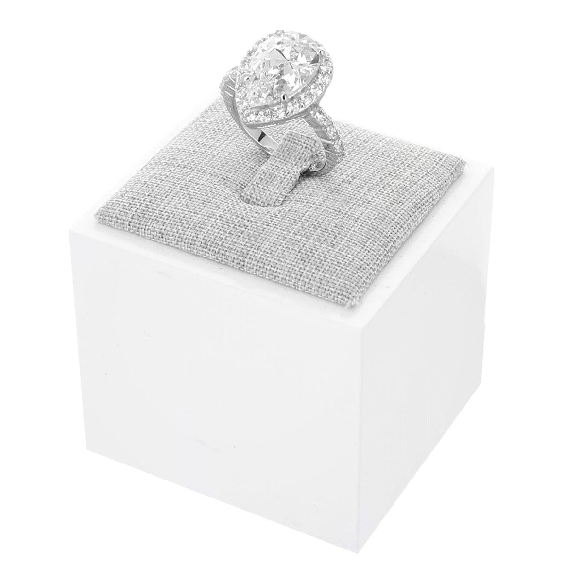 Single Ring Display jewelry stand with a silver halo engagement ring on gray fabric cushion by Lauren G Adams on Tampa Home & Garden Store