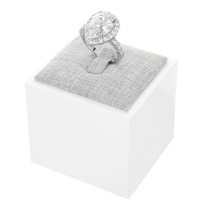 Single Ring Display jewelry stand with a silver halo engagement ring on gray fabric cushion by Lauren G Adams on Tampa Home & Garden Store