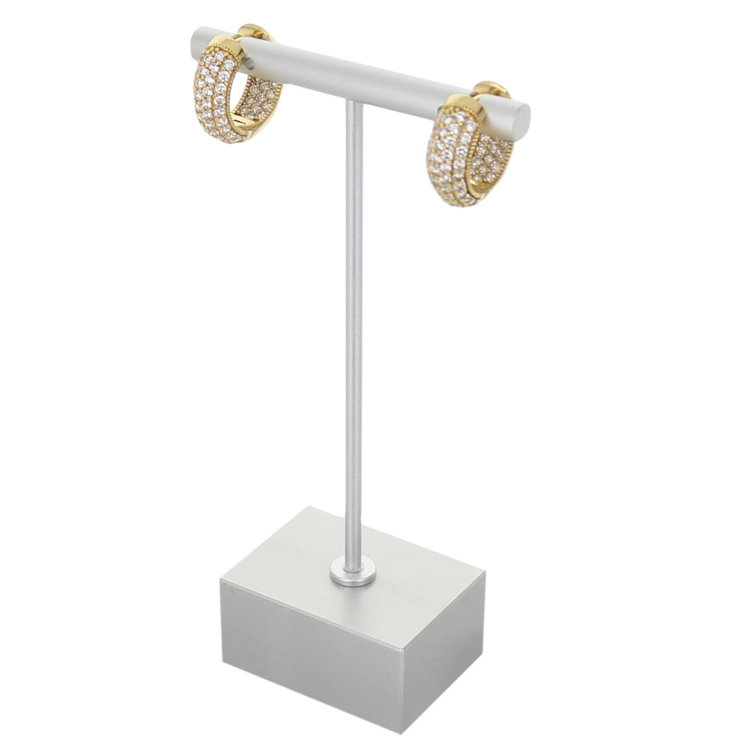 T shaped aluminum earring display with two gold-tone pave hoop earrings on a white base on Tampa Home & Garden Store