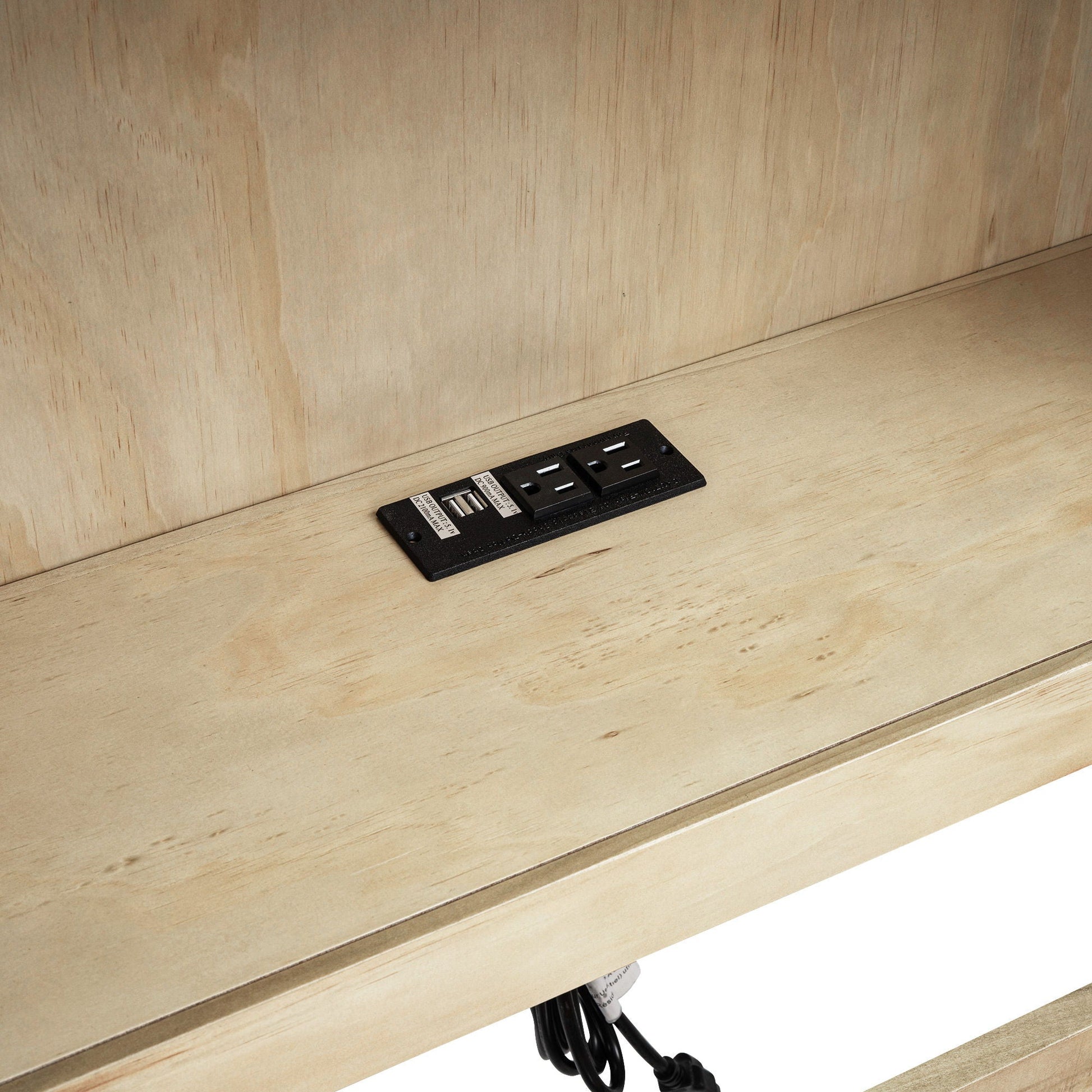 Power strip with USB ports and outlets on a wooden shelf on Tampa Home & Garden Store