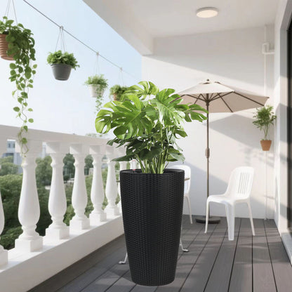 Tall black wicker planters set with lush greenery; water level monitor and auto watering on Tampa Home & Garden Store