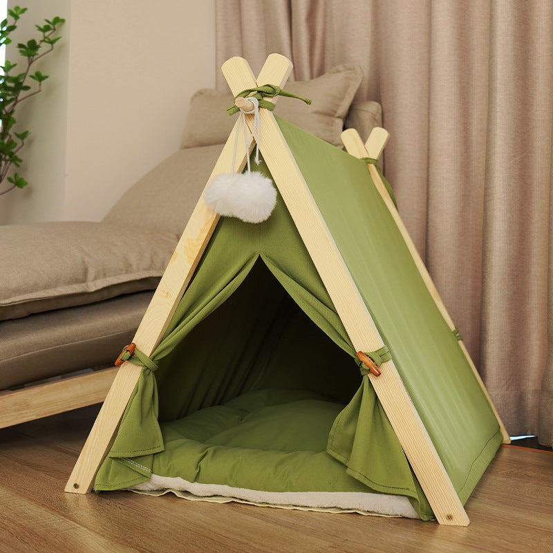 Pet tent teepee in green canvas with wood poles, removable and washable, white pom-pom on Tampa Home & Garden Store