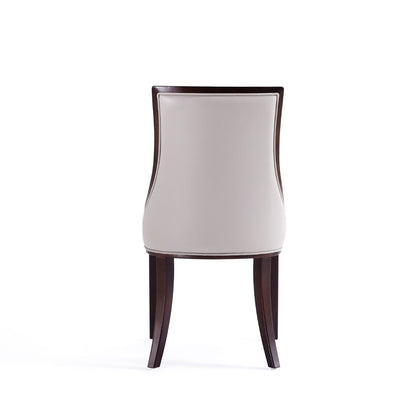 Grand dining chair back view with beige upholstery and dark beech wood frame on Tampa Home & Garden Store