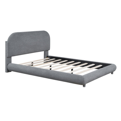 Gray upholstered platform bed with thick rounded headboard and visible wood slats on Tampa Home & Garden Store