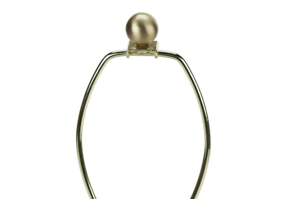 Table lamp cream resin sphere finial atop brass-tone curved frame on Tampa Home & Garden Store