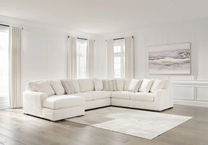 Chessington stationary sectional by Unique Piece Furniture in cream fabric with cushions in room on Tampa Home & Garden Store