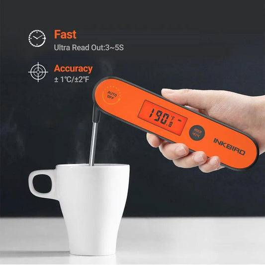 Orange INKBIRD digital BBQ thermometer with backlit LCD displaying 190.0°F, probe in white mug on Tampa Home & Garden Store