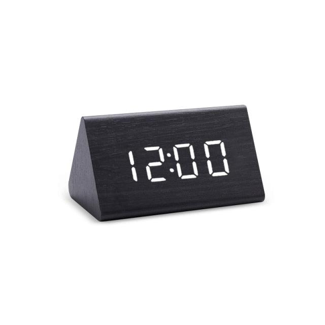 Wooden digital alarm clock with LED display in black wedge design showing 12:00 on Tampa Home & Garden Store