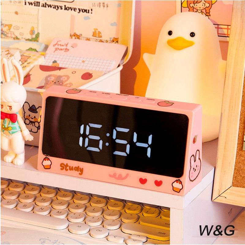 Pink digital desk clock with large LED display and snooze function on Tampa Home & Garden Store
