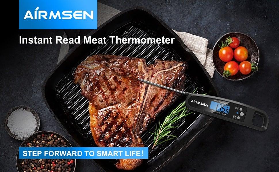 AirMSEN instant read digital meat thermometer with backlight beside grilled steak on Tampa Home & Garden Store