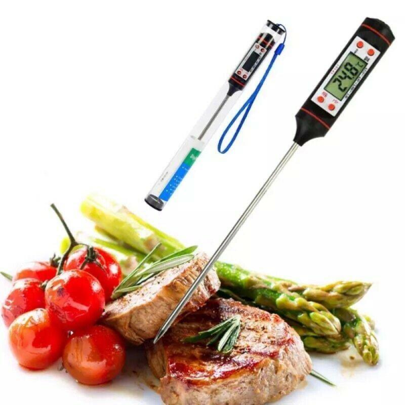 Stevvex digital meat thermometers (2) with LCD displays and stainless probes over grilled steak on Tampa Home & Garden Store
