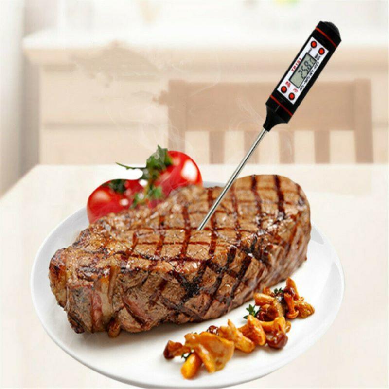 Stevvex digital meat thermometer with probe in grilled steak on white plate, LCD display on Tampa Home & Garden Store