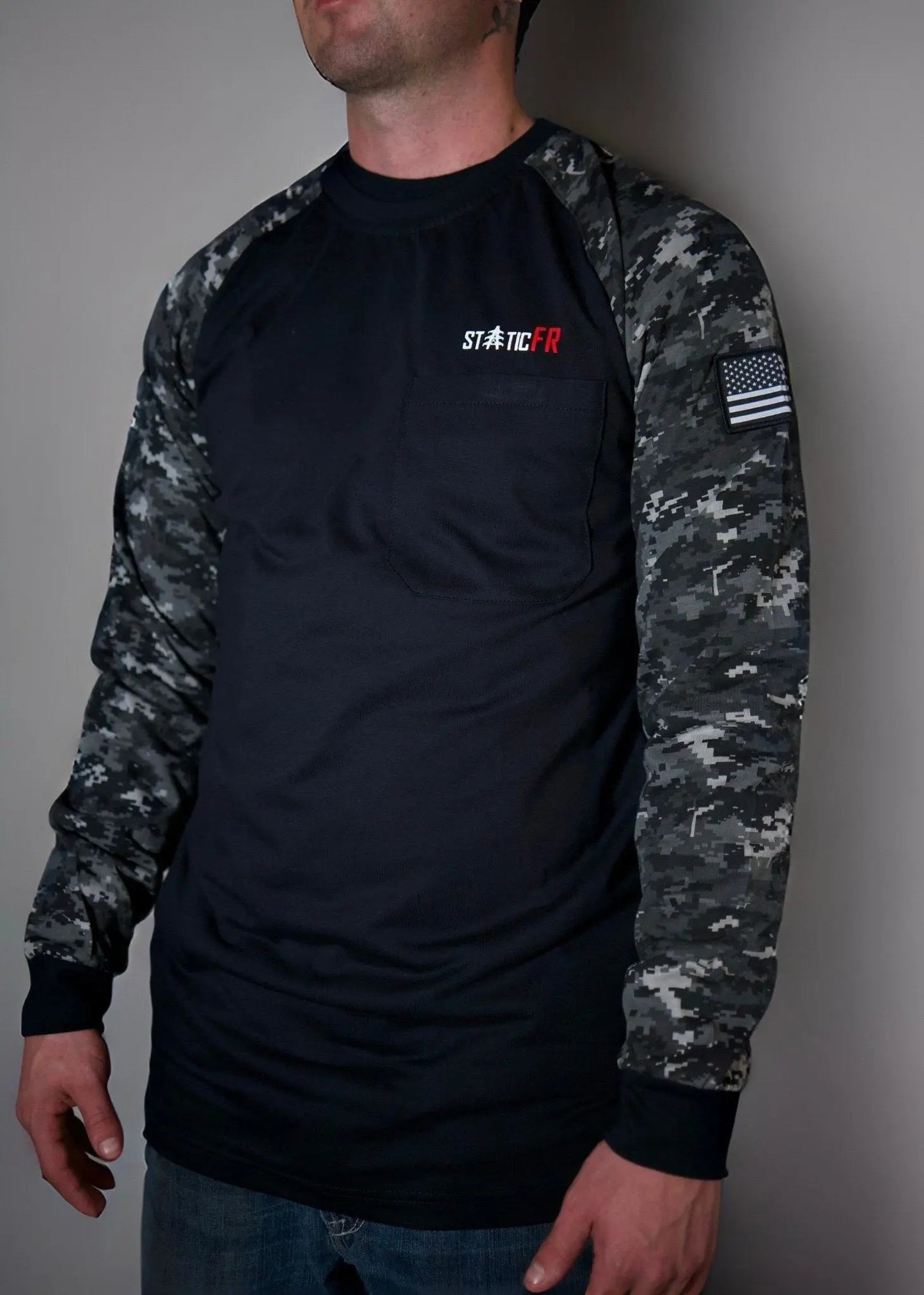 Static FR camo shirt with black torso, gray sleeves, chest pocket, US flag patch on sleeve on Tampa Home & Garden Store