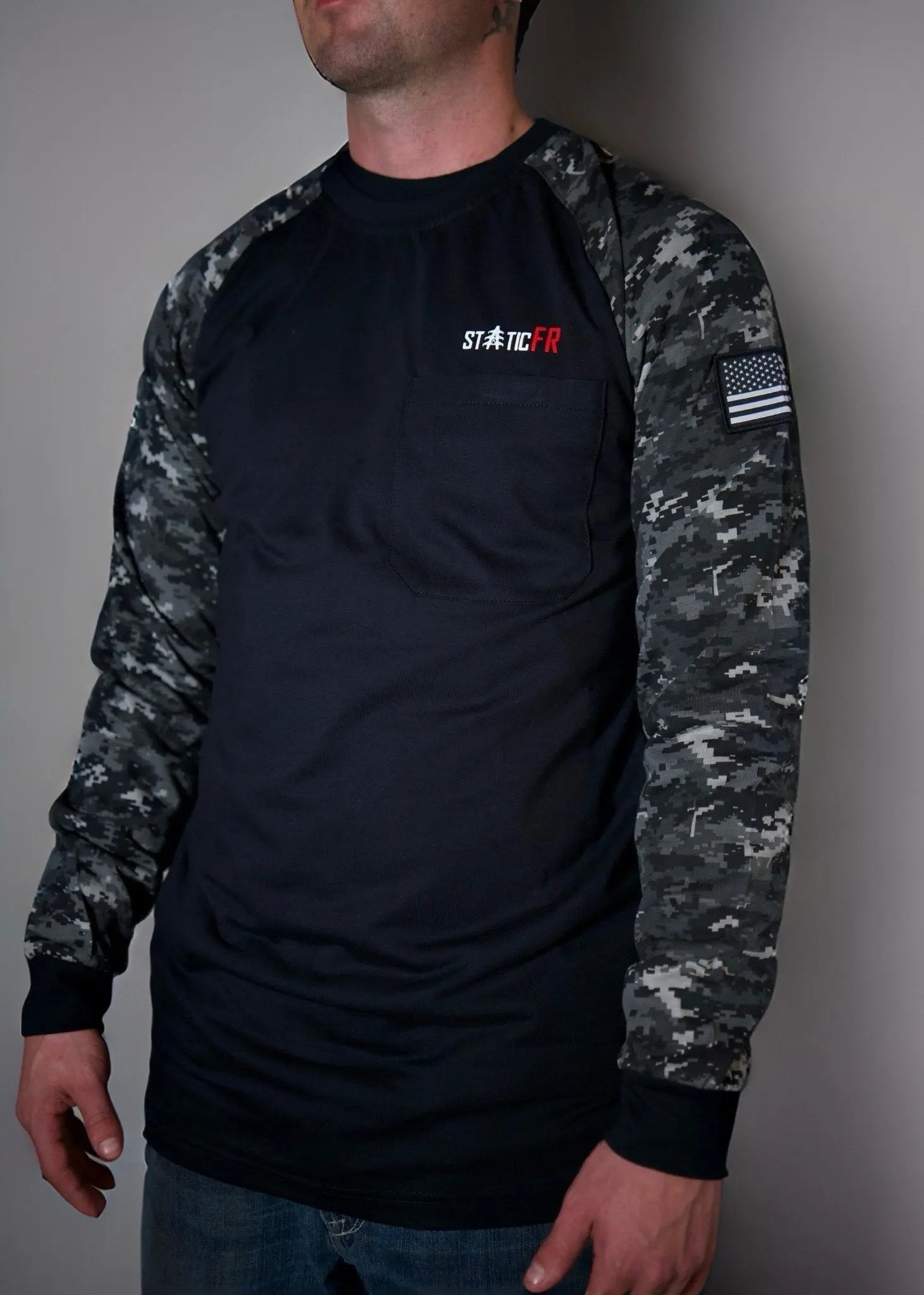 Static FR camo shirt with black torso, gray sleeves, chest pocket, US flag patch on sleeve on Tampa Home & Garden Store