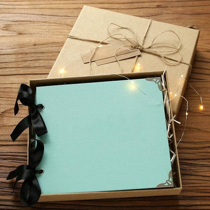 DIY Photo Album teal page, black ribbon binding by Stevvex on Tampa Home & Garden Store