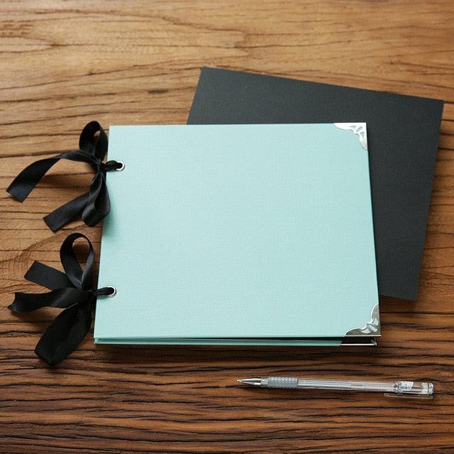 Stevvex DIY Photo Album Scrapbook light blue cover, black ribbon binding, 20 pages, case binding on Tampa Home & Garden Store