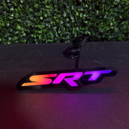 Dodge SRT RGBW Flow Series LED badge emblem with multicolor gradient and coiled power cord on Tampa Home & Garden Store