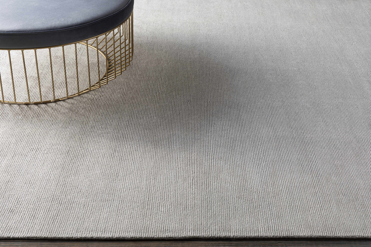 Donegal Carpet rug in light gray with subtle ribbed texture on Tampa Home & Garden Store