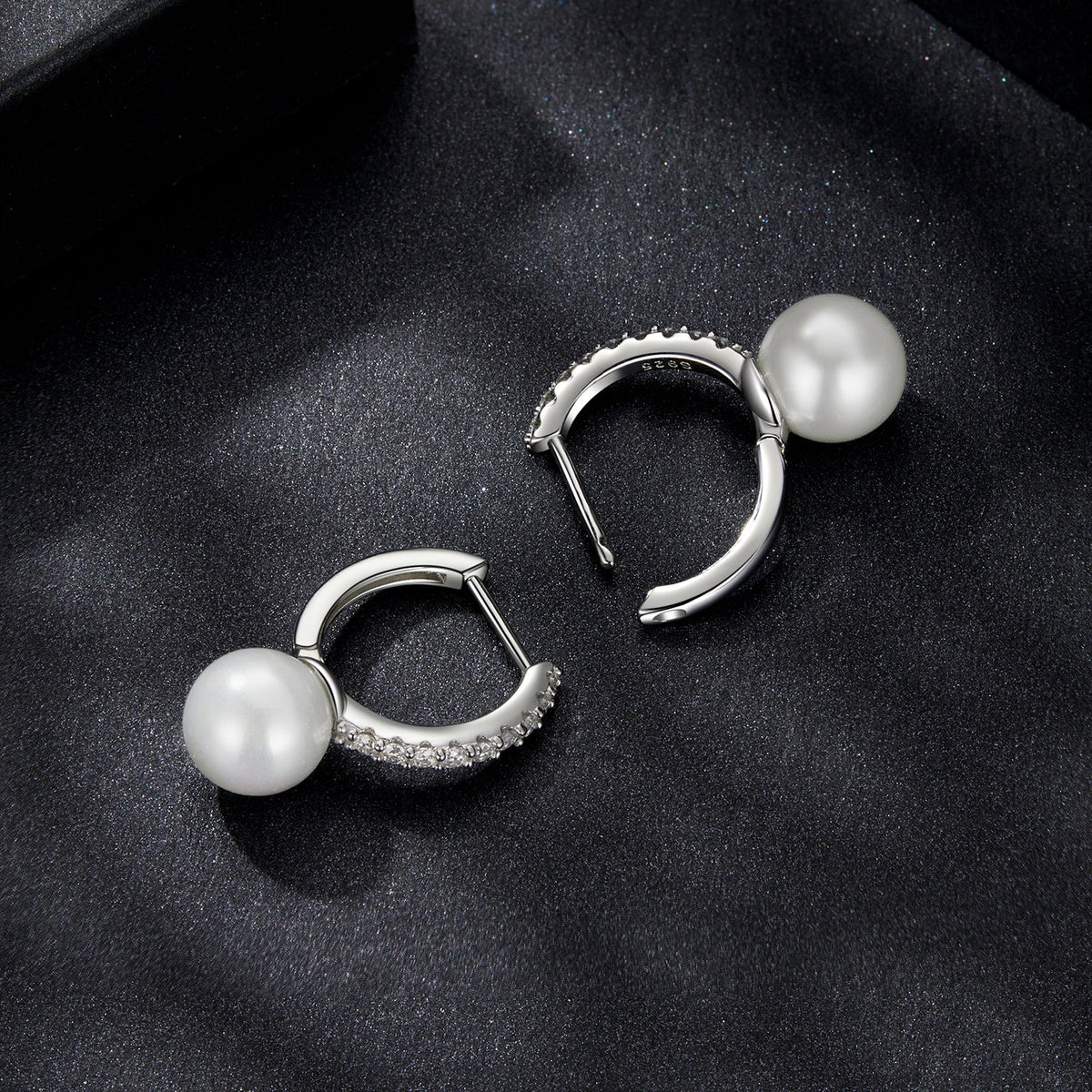 Pair of 925 sterling silver hoop earrings with moissanite pave and white shell pearl beads on Tampa Home & Garden Store