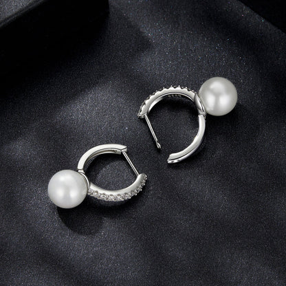 Pair of 925 sterling silver hoop earrings with moissanite pave and white shell pearl beads on Tampa Home & Garden Store