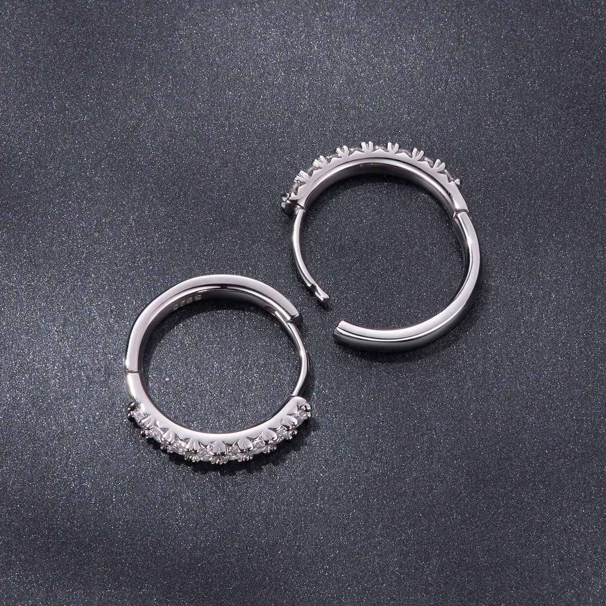 Pair of 925 silver moissanite earrings, 1.6cm hoops, one plain and one pave-stone on Tampa Home & Garden Store