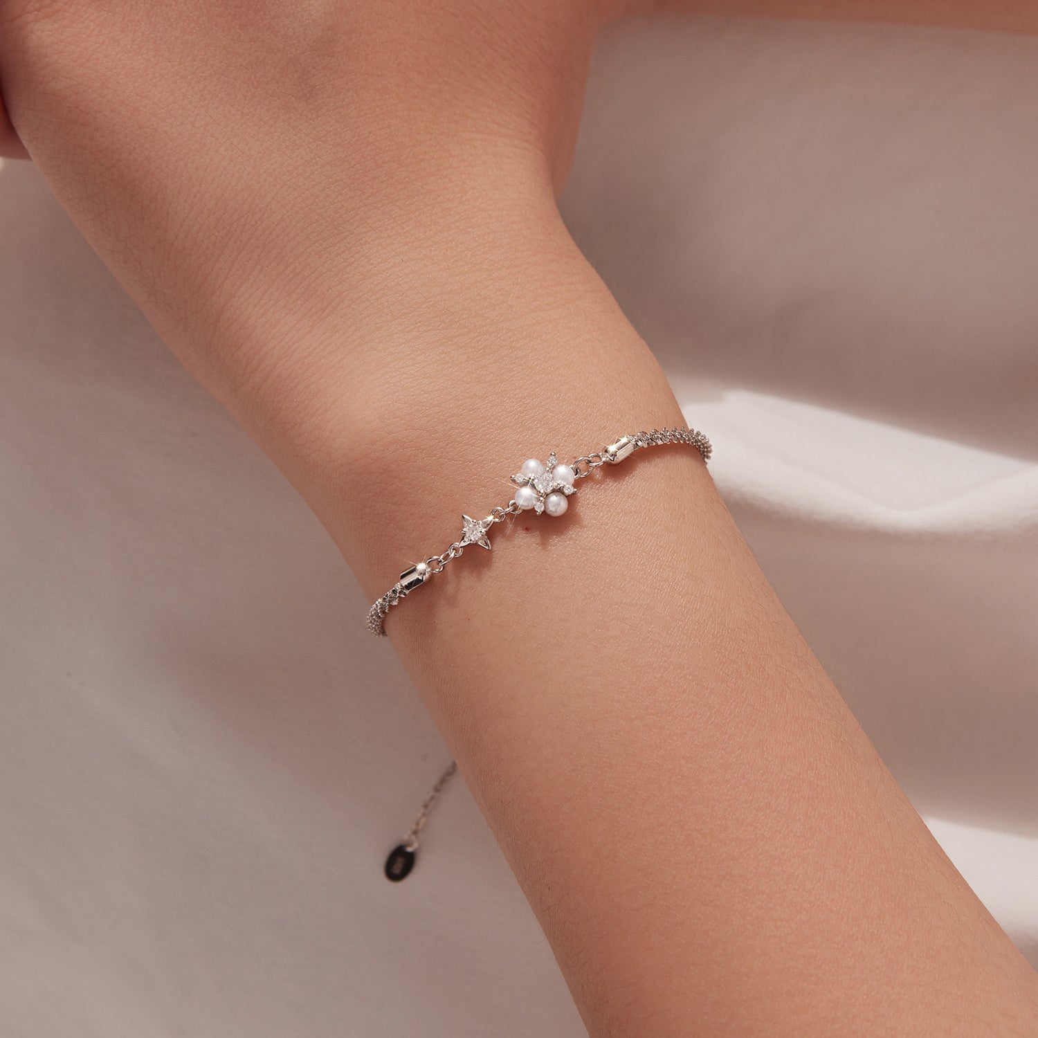 925 Sterling Silver Adjustable Moissanite & Natural Pearl Bracelet with pearl cluster on wrist on Tampa Home & Garden Store
