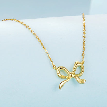 Gold-tone bow pendant necklace with 40+5cm adjustable chain by Bids.com on Tampa Home & Garden Store