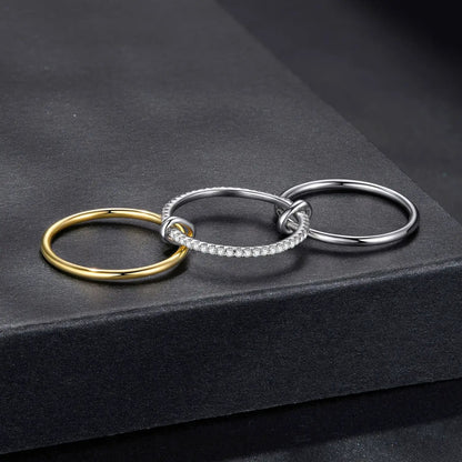 Rings set of 4 interlocking bands in gold and silver finishes with pavé moissanite accents on Tampa Home & Garden Store