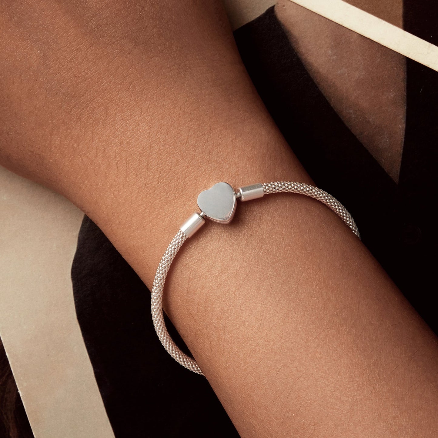Sterling silver bracelet with heart charm on a silver mesh band for women on Tampa Home & Garden Store